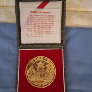 Gold Commemorative Coin in Display Case